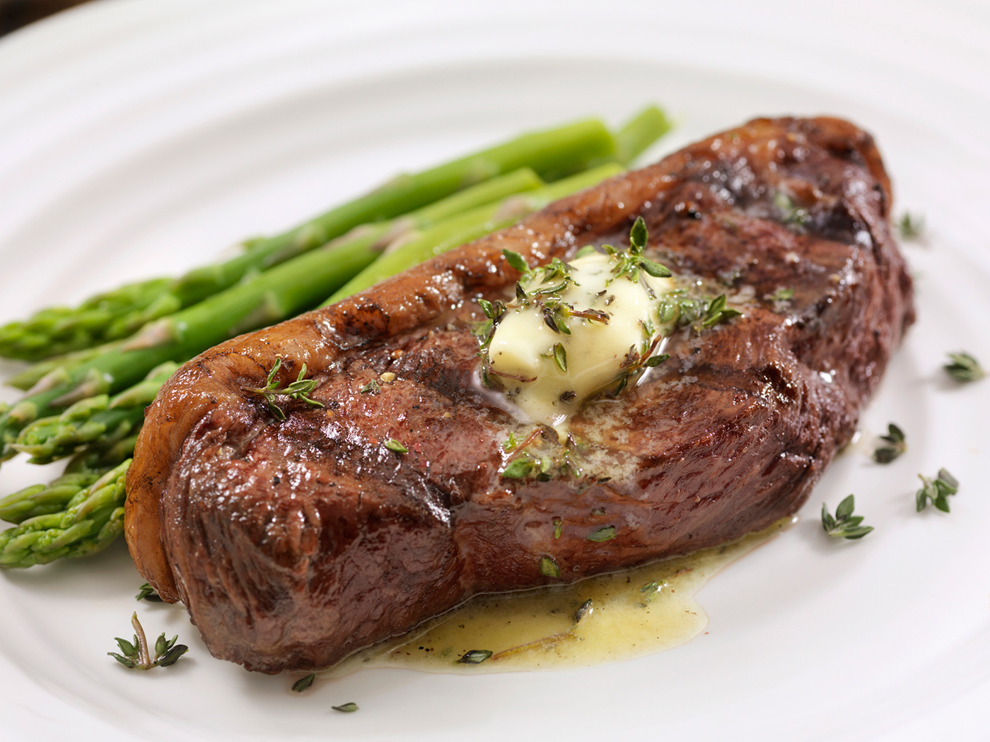 grilled new york steak with garlic butter