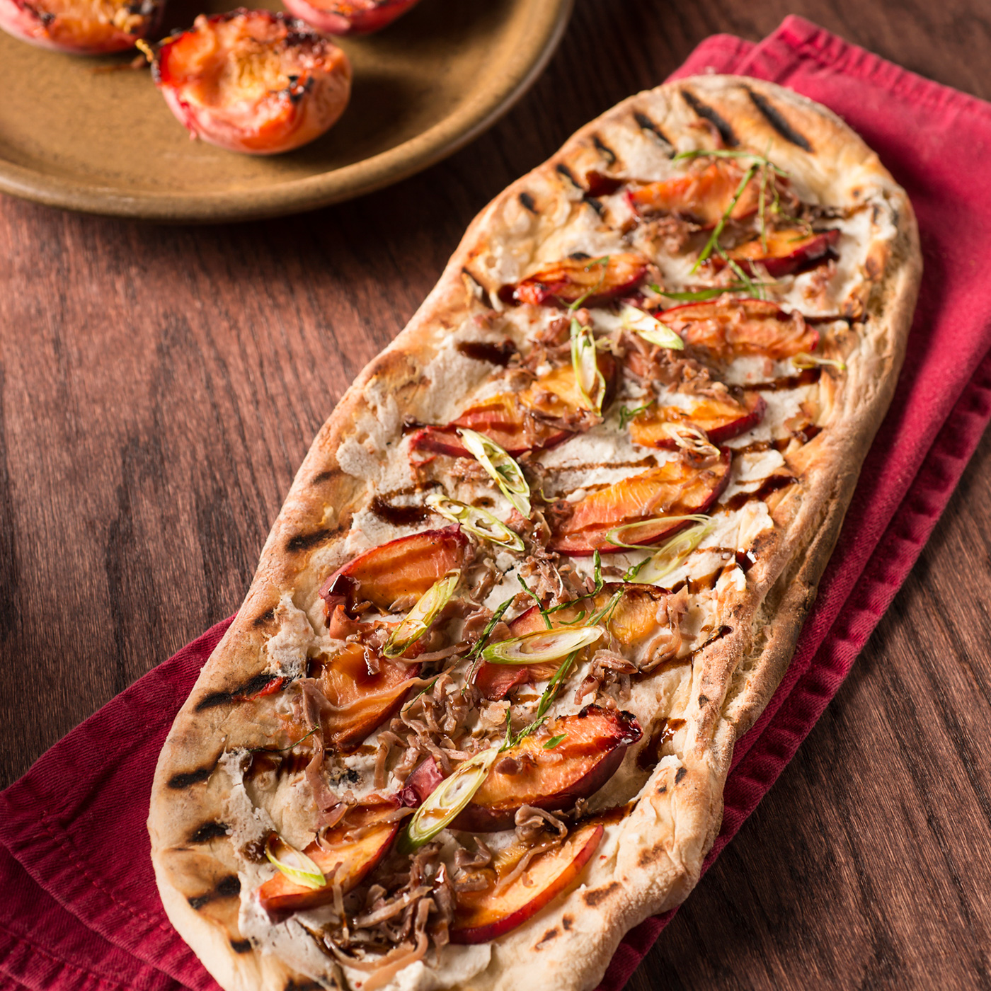 grilled peach and goat cheese pizza