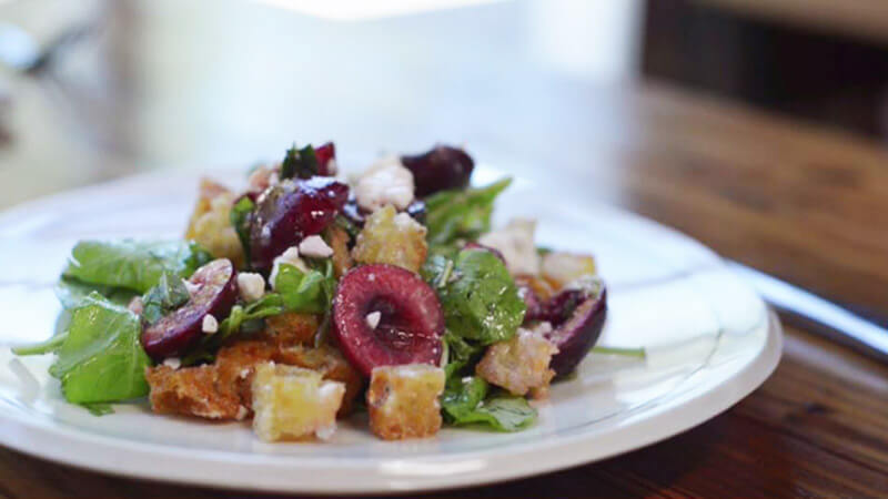 brioche panzanella with cherries, mint, basil & feta