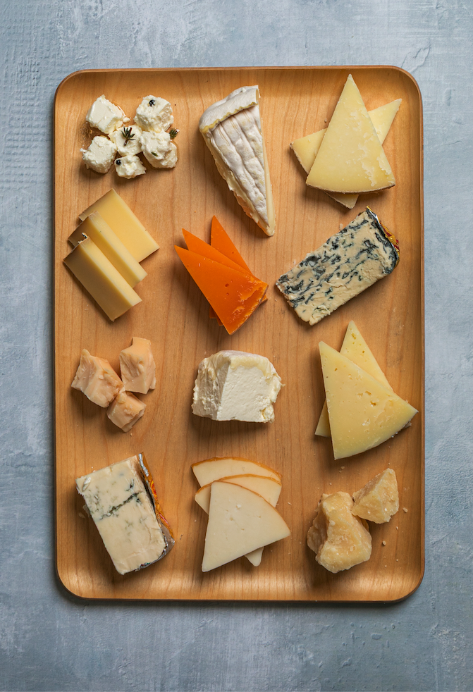 cheese on a wooden board