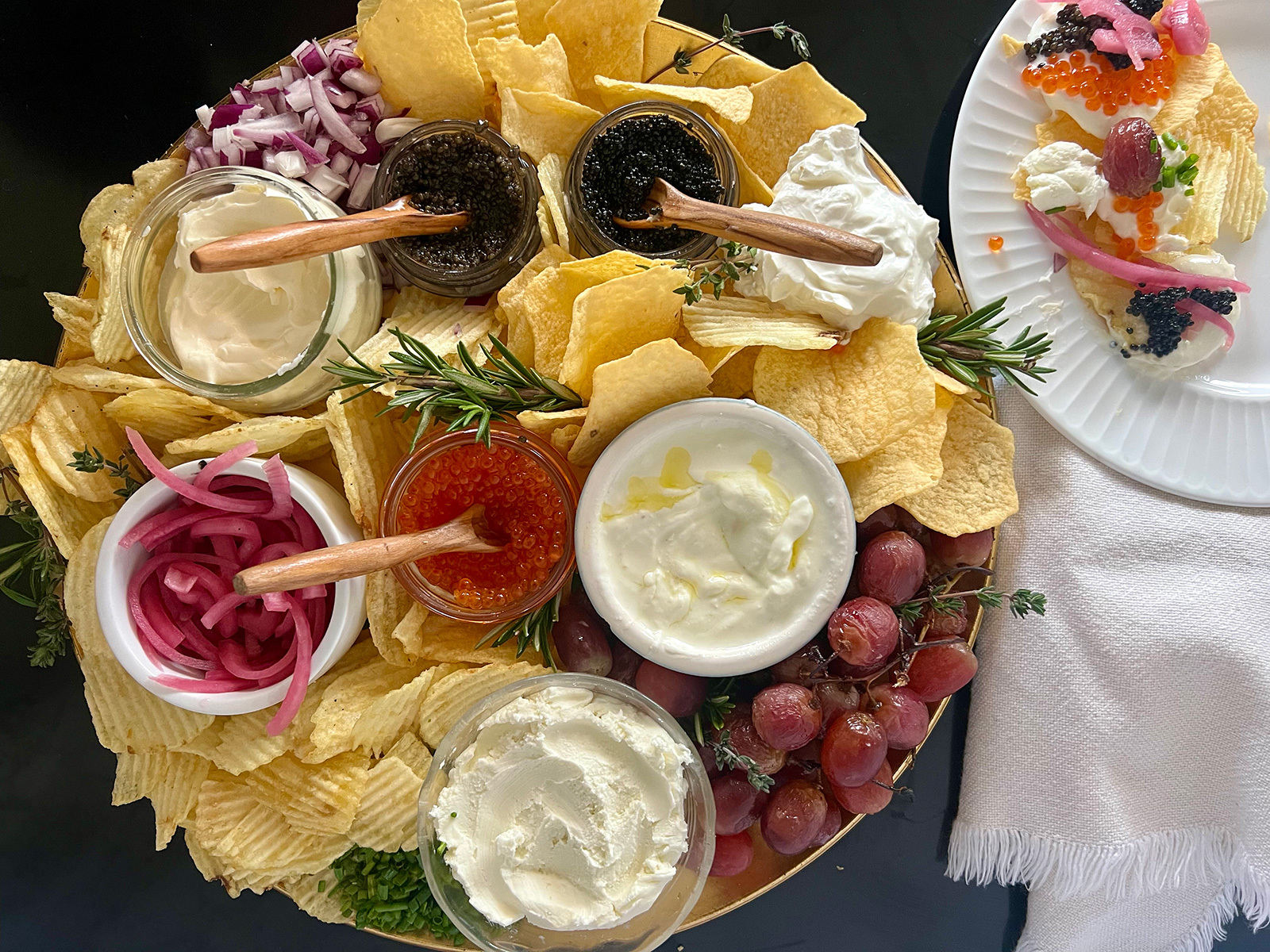 caviar and potato chip appetizer board